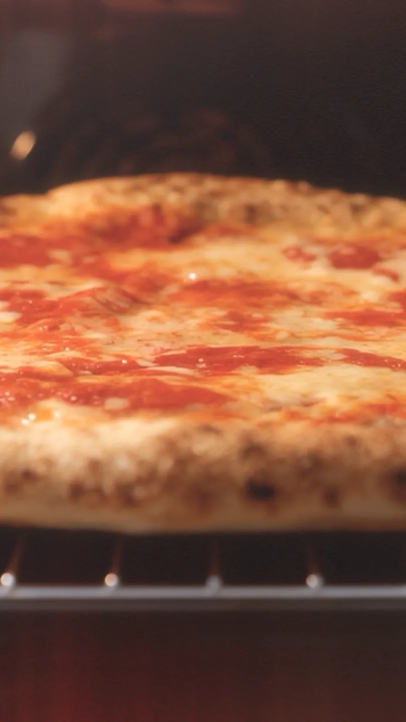 Pizza baking in the oven